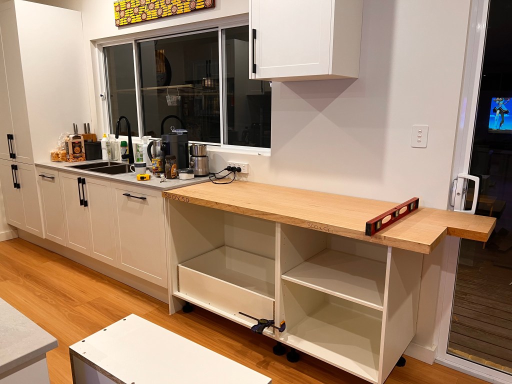 Kitchen with extension to bench